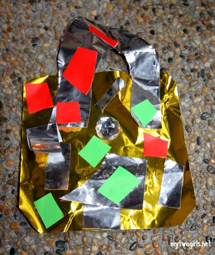 Zara made a bag with pieces of paper